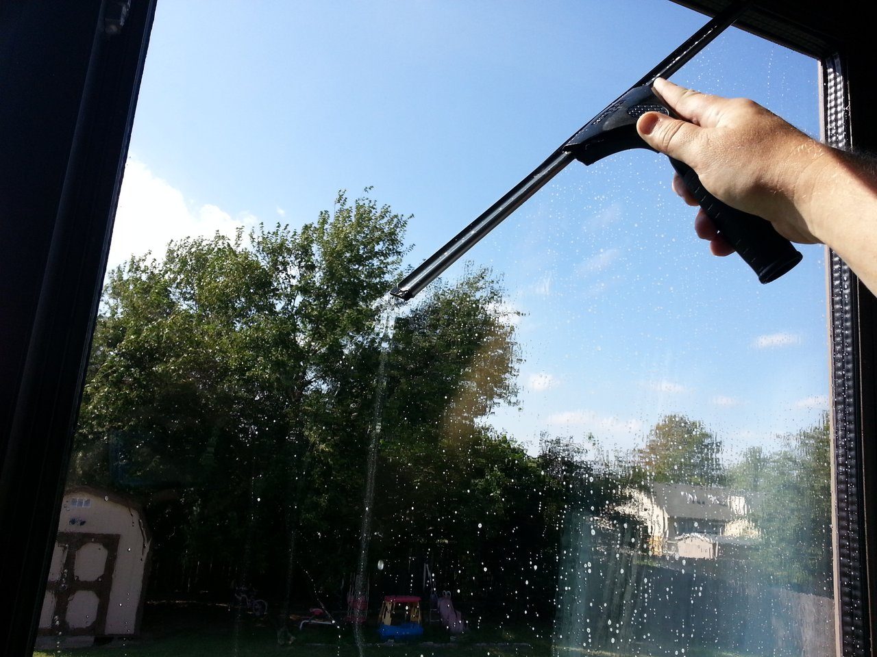 First-person view through a freshly cleaned residential window